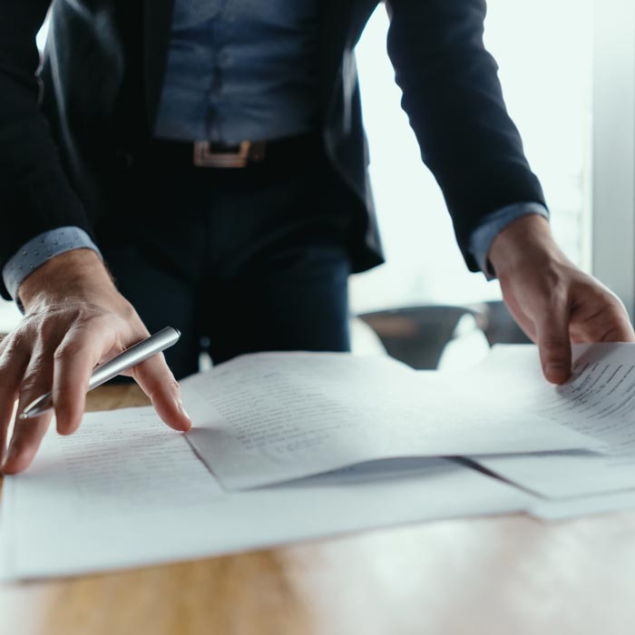 man organizing paperwork