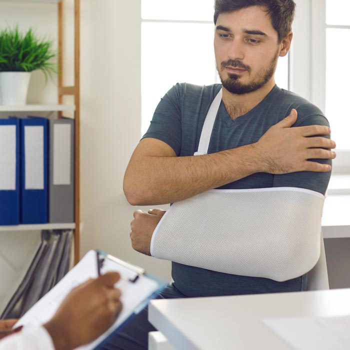 man with broken arm